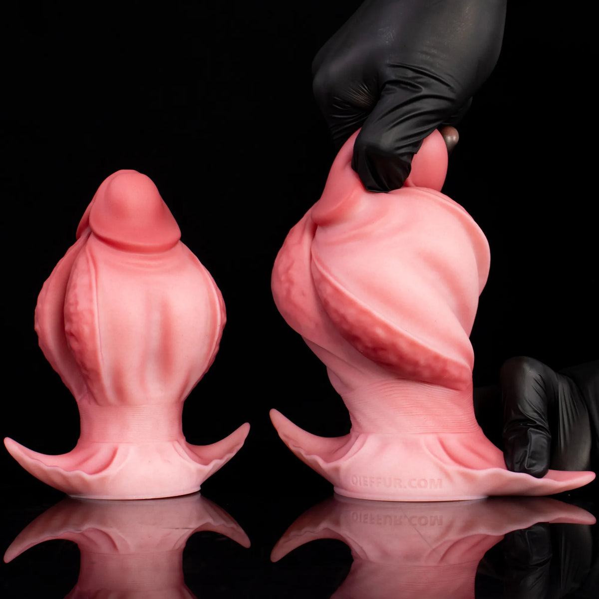 Oieffur Fissure Fantasy Stroker petal-folded platinum silicone dildo, penetrable fantasy toy with detailed petal folds.