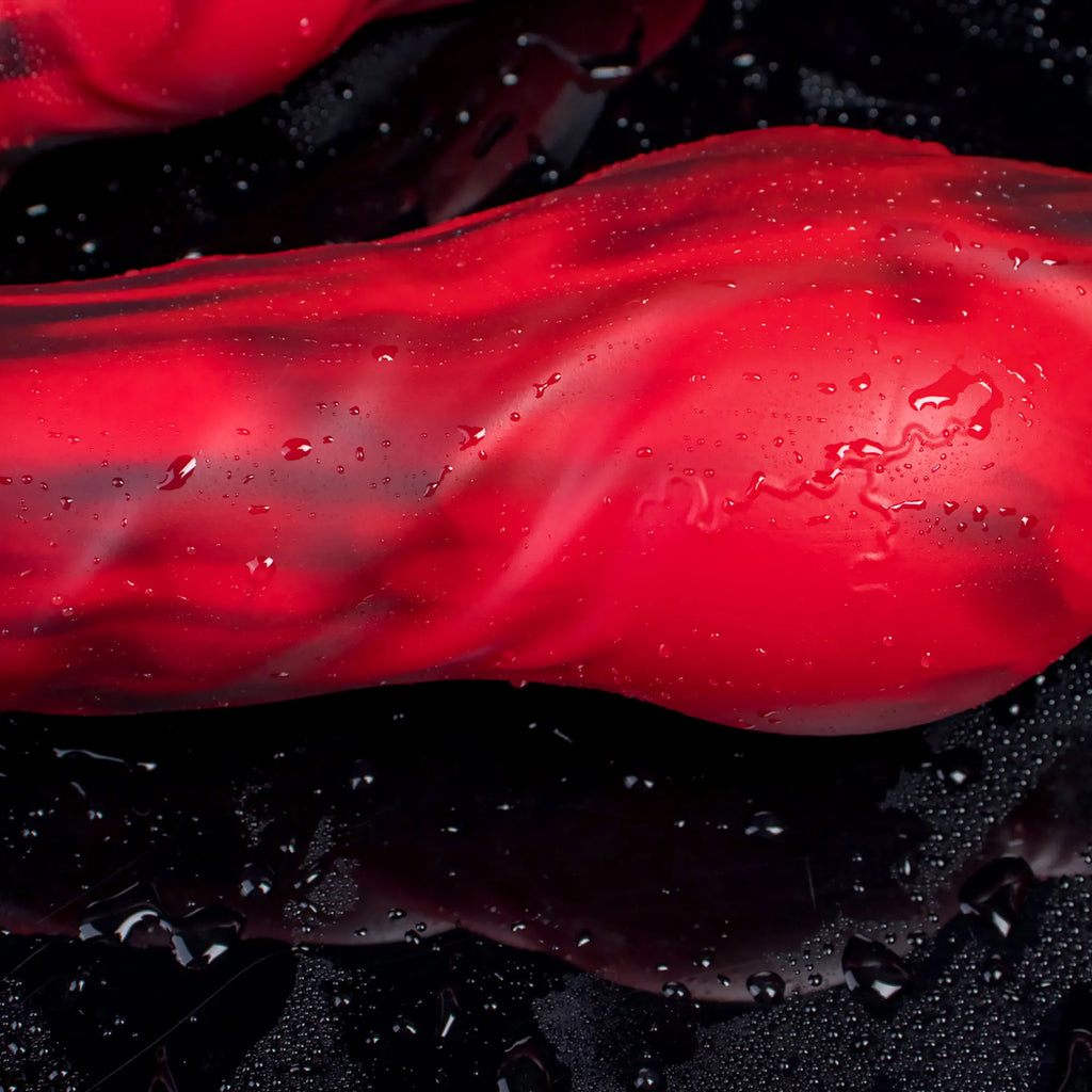 Sculpted silicone wolf and dog dildo by Oieffur, featuring detailed animal design and defined surface for adult pleasure use.