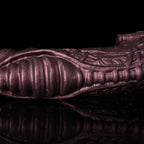 Oieffur Cyberpunk Sheath Male Extender Sleeve with mechanical design, soft silicone feel, and sculpted surface for penis enhancement.