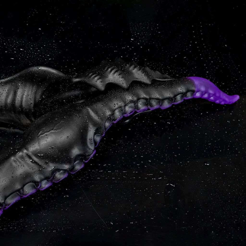 Oieffur Twin Fantasy double-ended dildo with alien tentacle design, featuring sculpted silicone surface and dual insertable ends.