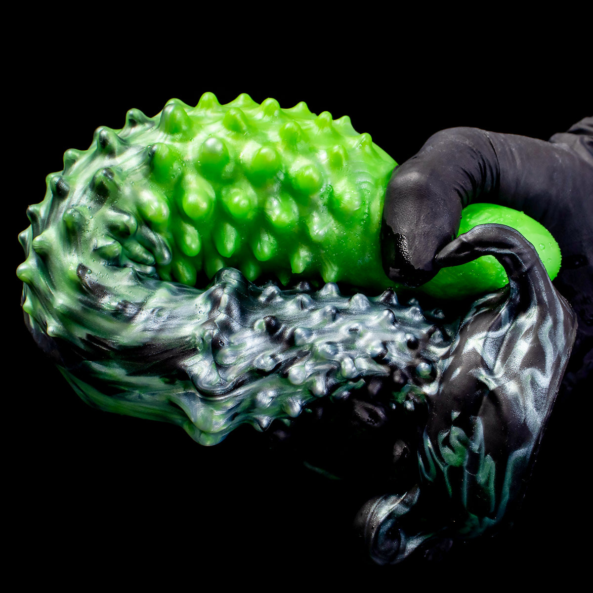Black "Abyss" spiked dildo by Oieffur, made of platinum silicone, featuring a sculpted, spiked design for fantasy adult pleasure.