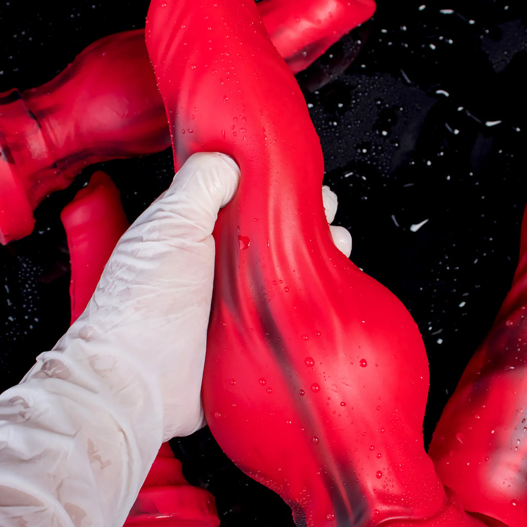 Sculpted silicone wolf and dog dildo by Oieffur, defined design resembling a wolf and dog for adult use.