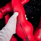 Sculpted silicone wolf and dog dildo by Oieffur, defined design resembling a wolf and dog for adult use.
