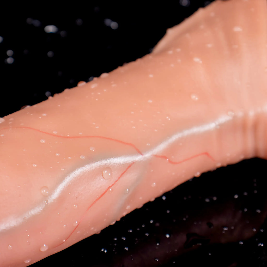 Oieffur Lifelike Sleeve Penis Extender with enhanced length and girth, sculpted design, and defined surface for added stimulation.