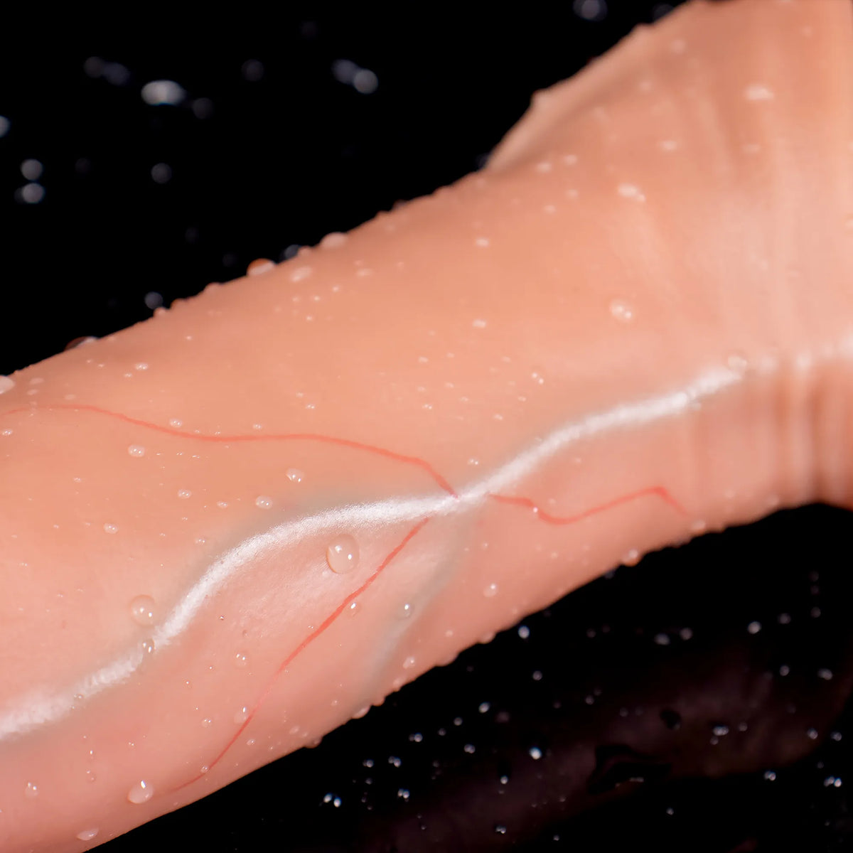 Oieffur Lifelike Sleeve Penis Extender with enhanced length and girth, sculpted design, and defined surface for added stimulation.