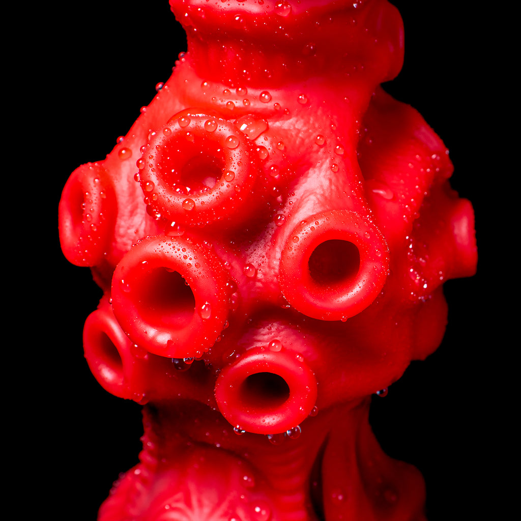 Oieffur Abyssal Depths beaded dildo made of platinum silicone, featuring sculpted beads for sensory stimulation.