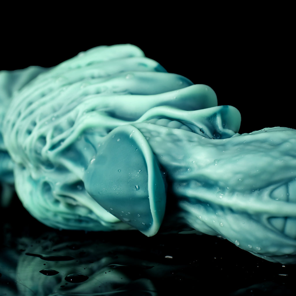 Oieffur Winding Fantasy Dildo with sculpted beads for pleasure, featuring a colorful, twisting design and defined detail.