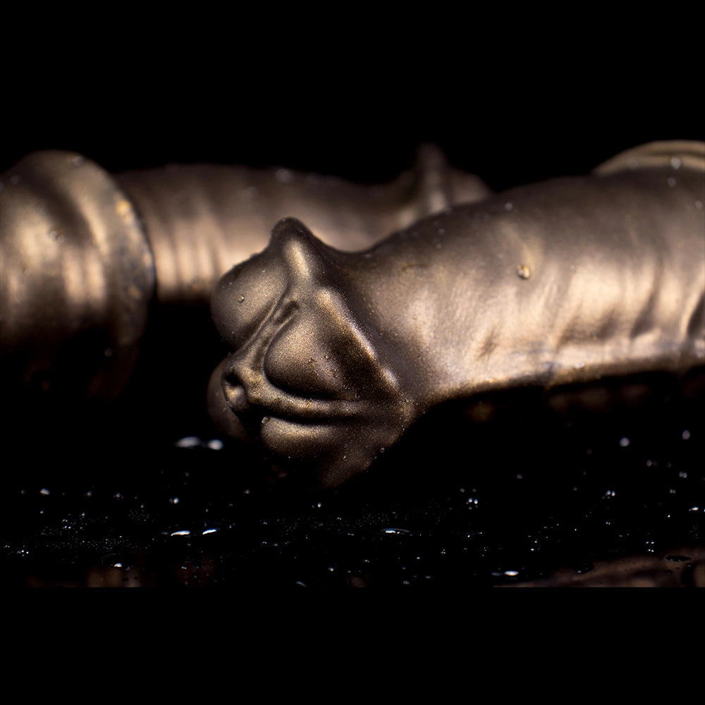 Oieffur Warhorse flexible penis sleeve extender with girth enhancement and cock ring, showing the sculpted sheath and ring in detail.