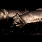 Oieffur Warhorse flexible penis sleeve extender with girth enhancement and cock ring, showing the sculpted sheath and ring in detail.