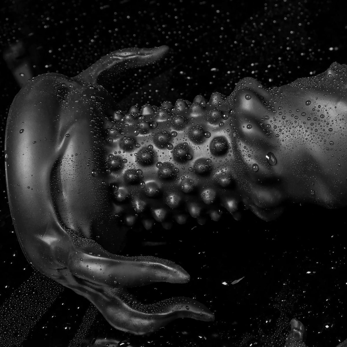 Black "Abyss" spiked fantasy dildo by Oieffur, made of platinum silicone, featuring a sculpted, monster design for intimate use.