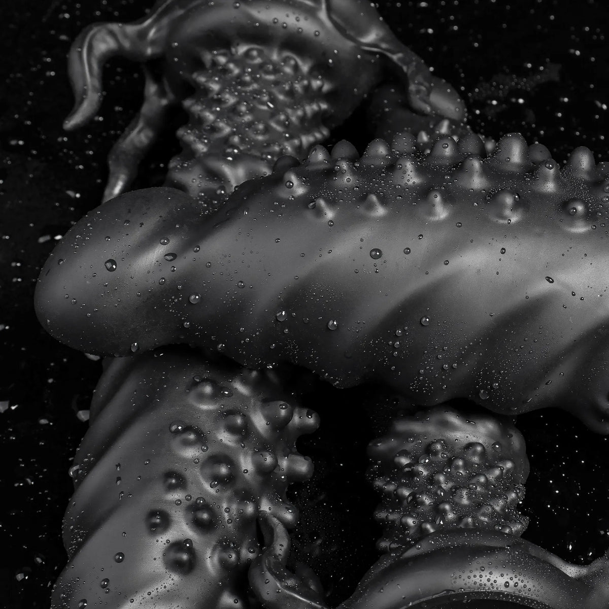 Black "Abyss" Spiked Fantasy Dildo by Oieffur, made of platinum silicone, featuring a sculpted, monster design for intimate use.