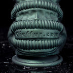 Oieffur Nexus Node Monster Toy fantasy dildo with alien-inspired sculpting in platinum silicone, showcasing detailed surface and sculpted design.