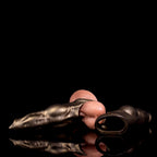 Canine-shaped dog penis sleeve made of platinum silicone, designed as a canine cock extender, for enhanced pet intimacy.